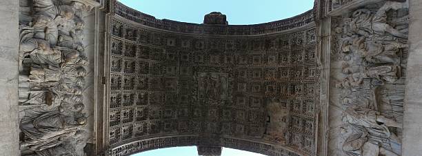 Benevento - Intrados of the Arch of Trajan Benevento, Campania, Italy - March 27, 2016: Panoramic photo of the soffit of the Arch Trajan with coffered vault and sculptural reliefs ancient rome stock pictures, royalty-free photos & images