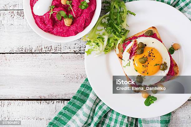 Diet Sandwiches With Beet Root Hummus Capers And Egg Stock Photo - Download Image Now