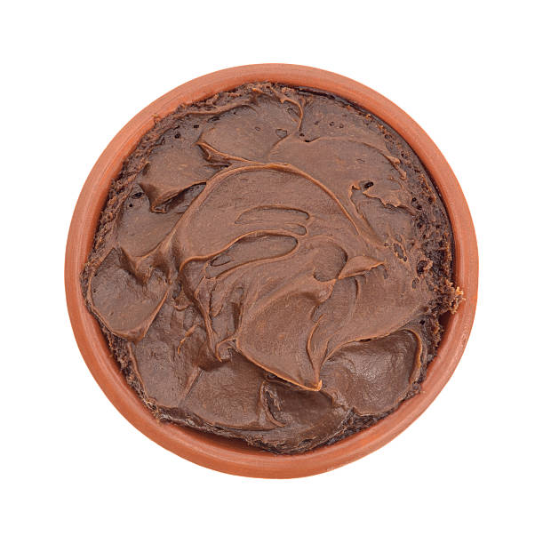 istock Chocolate fudge frosting in a small bowl 517807134
