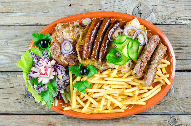 istock Mixed grilled meats on a plate 517809210