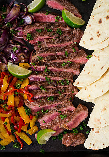 Mexican fajitas for beef steak and grilled vegetables Mexican fajitas for beef steak and grilled vegetables. Top view fajita photos stock pictures, royalty-free photos & images