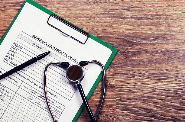 istock cardiologist stethoscope paper insurance 517809812