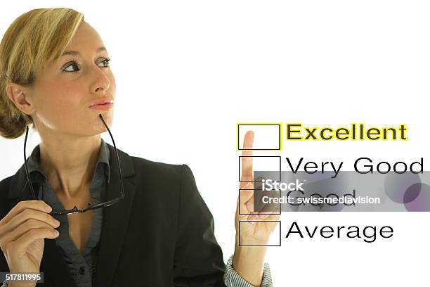 Businesswoman Pensive And Rating On Checklist Stock Photo - Download Image Now - Achievement, Adult, Advice