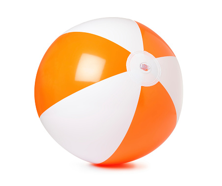 Colored inflatable beach ball on white background