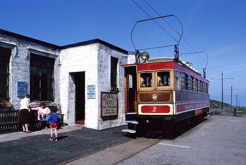 Douglas, Isle of Man,UK - 15 July 1996: Snaefell Mountain railway summit station at 2034 feet is an excellent viewpoint for visitors and tourists who can enjoy spectacular view over the island and the Irish Sea.