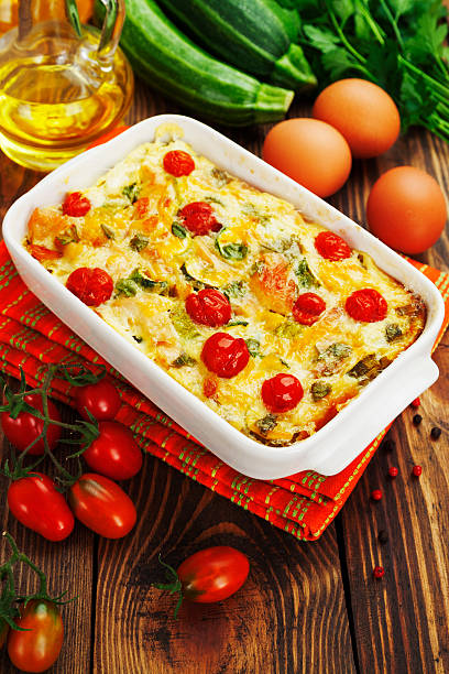 istock Zucchini baked with chicken, cherry tomatoes and herbs 517814303