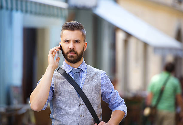 istock Hipster businessman with mobile 517815403