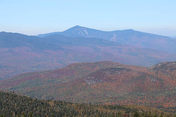 Whiteface Mountain, New York Whiteface mountain see from the summit of Hurricane mountain on a beautiful fall day.  Fall foliage is near peak color. whiteface mountain stock pictures, royalty-free photos & images