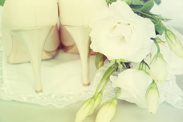istock Bride shoes with flowers. 517818007