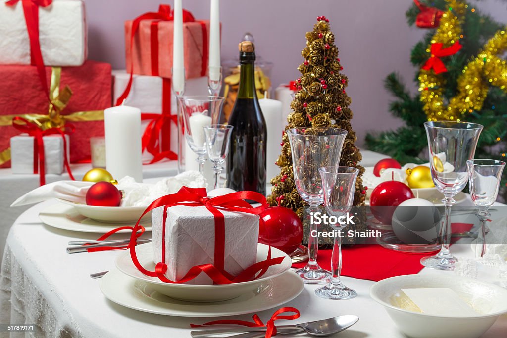 Christmas gift on the table White and red decorations on the Christmas table Arrangement Stock Photo