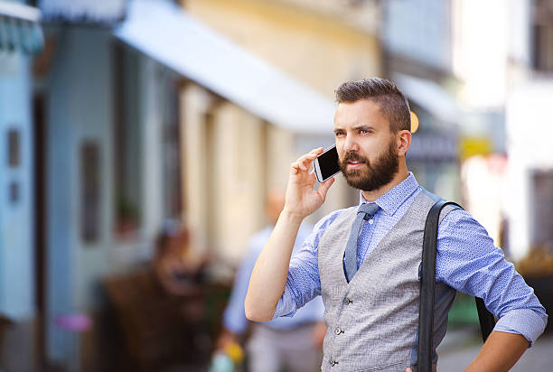 istock Hipster businessman with mobile 517828213