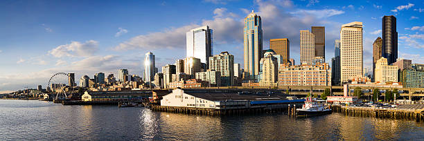 istock Seattle Washington Skyline At Sunset From Bainbridge Island Ferry Dock. 517829349
