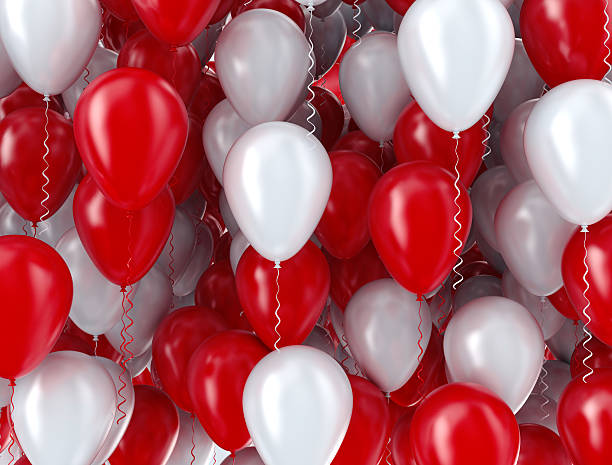 Red and white balloons background stock photo