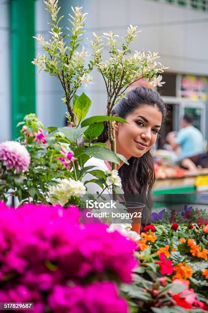 Young Woman Buying Flowers Stock Photo - Download Image Now - 20-29 Years, Adult, Adults Only