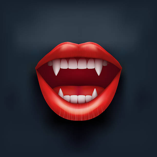 istock Dark Background of vampire mouth with open lips. 517830267
