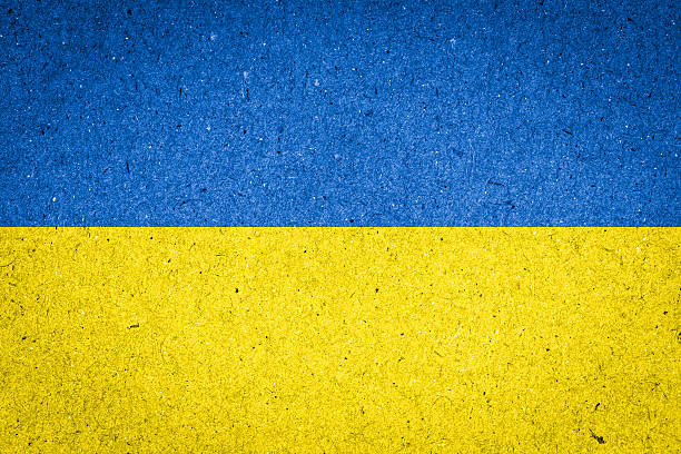 istock Ukraine flag on paper background 517832501