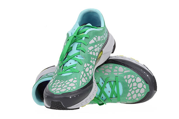 istock Green Hiking shoes on white background 517833425