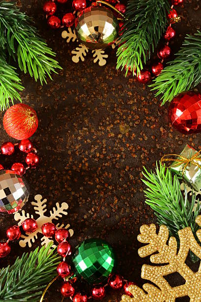 istock Christmas fir tree frame with decoration on iron background 517833845
