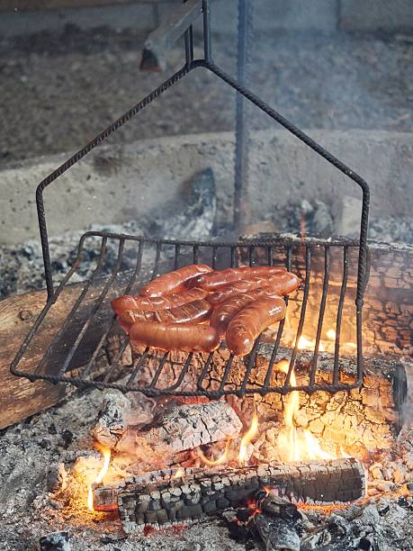 istock Outdoor firepalece and sausages 517842024