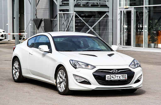 Ufa, Russia - August 31, 2013: Motor car Hyundai Genesis is parked in the city street.