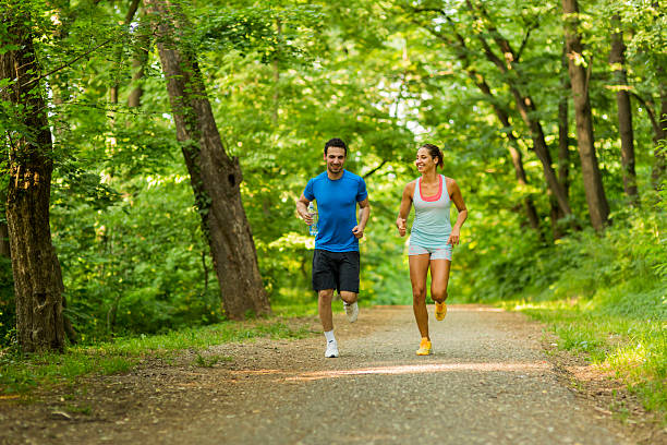 istock Young people running in nature 517844154