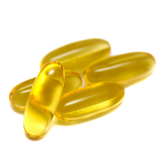 istock Omega 3 capsules from Fish Oil on white background 517846809
