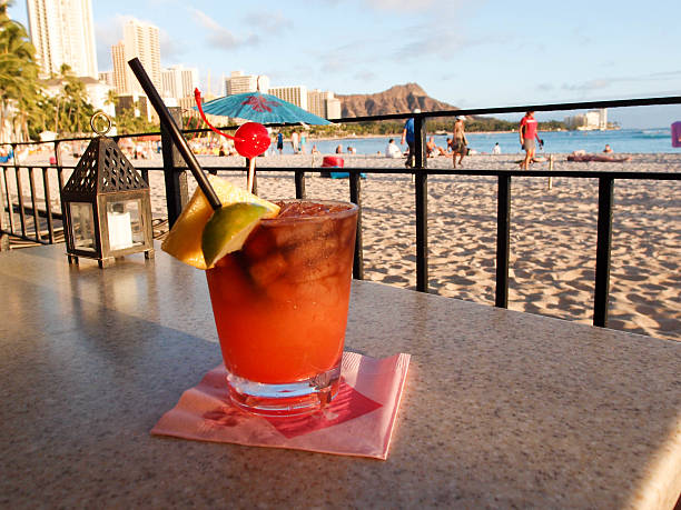 mai tai cocktail at beach in Hawaii mai tai cocktail at beach in Hawaii mai tai stock pictures, royalty-free photos & images