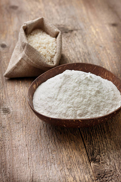 istock rice flour in a wooden bowl 517847424