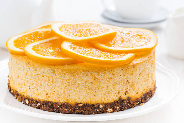 istock whole orange cheesecake, close-up 517847736