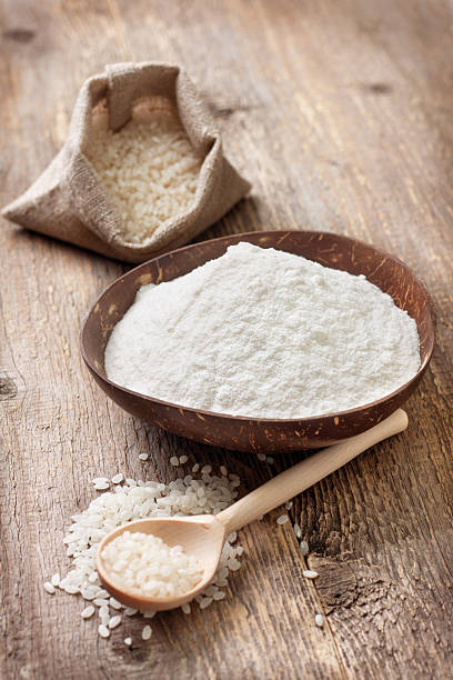 istock rice flour in a wooden bowl 517848186