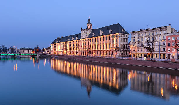 istock Wroclaw university, view from river Odra, in the evening. Poland 517849050