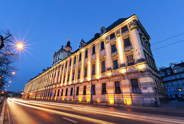 istock Wroclaw university with vehicular light trails, in the evening. Poland. 517849170