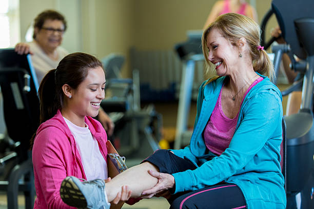 istock Senior woman meets with physical therapist 517849252