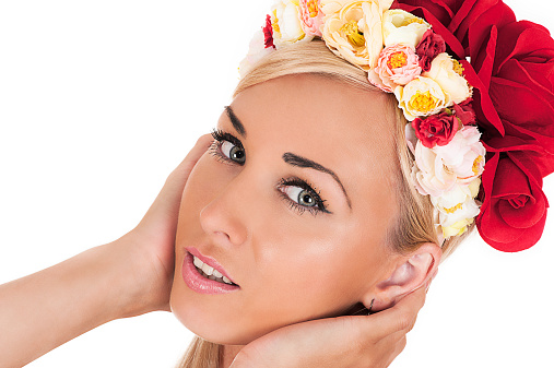 beautiful woman face with floral rim on the head