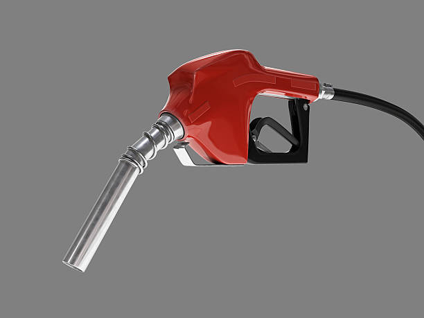 istock Red Gasoline Pump Nozzle Perspective View on Gray Background 517849424