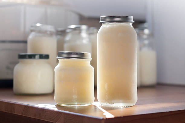 istock Frozen mother milk in bottles 517849734