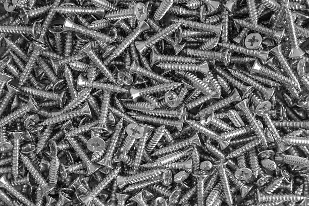 fundo de muitos prata parafusos - bolt nut screw hardware store imagens e fotografias de stock