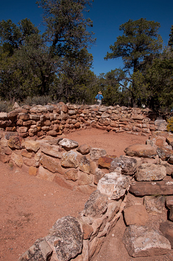 Grand Canyon National Park, Arizona, USA - September 24, 2014: These ruins were left by the Tusayan Pueblo native Americans who lived near the Grand Canyon South Rim about eight centuries ago. Dwellngs were constructed of mud, wood, and rock.
