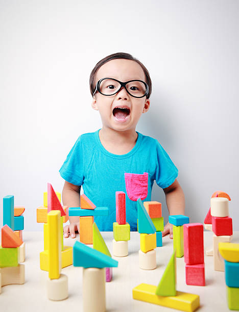 istock Cute asian Children playing with blocks 517850577