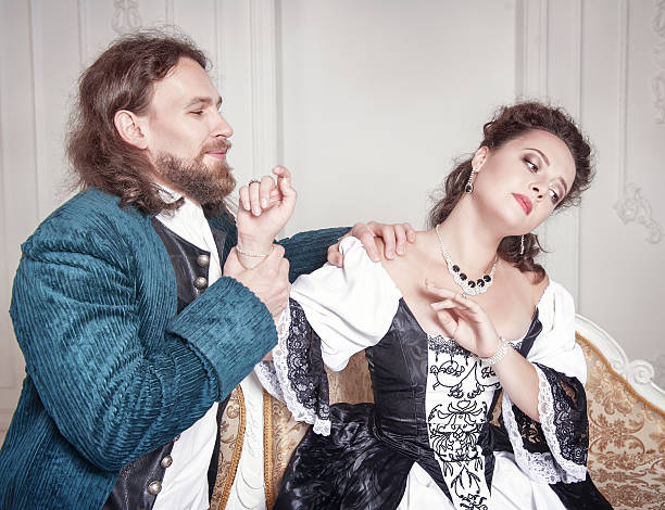 istock Beautiful woman and man in medieval clothes 517850626