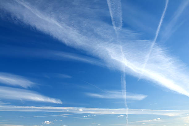 istock Beautiful landscape with white clouds on clear blue sky 517851423