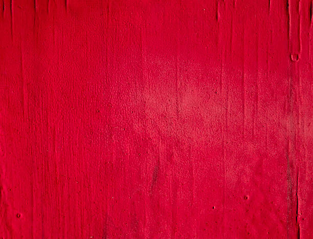 istock Old paint bright red on a wooden board 517851662
