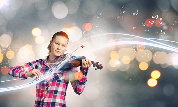 istock Girl with violin 517851685