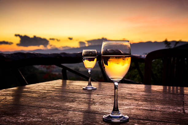istock Two Wine Glasses with Landscape Background 517851734