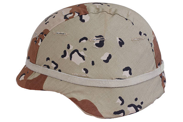 istock us army helmet with a desert camouflage cover 517853813