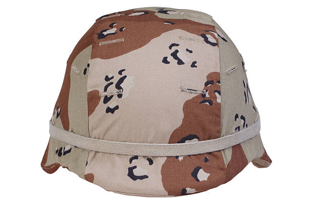 istock us army helmet with a desert camouflage cover 517853819