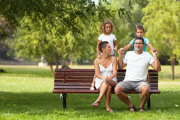 istock Young Family Having Fun In Park 517854169