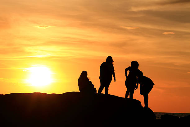 istock Silhouette people the evening sunset. 517854279