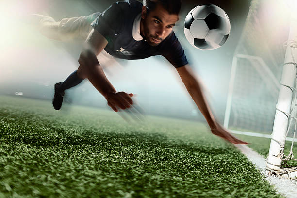 istock Soccer player heading soccer ball 517863092