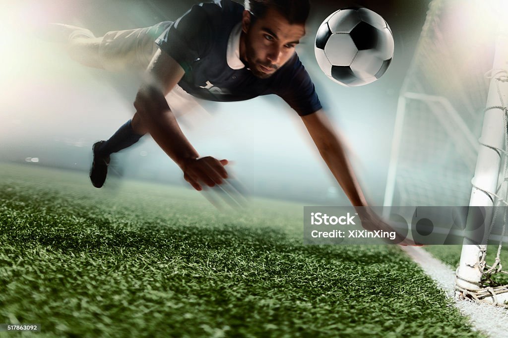 Soccer player heading soccer ball Heading The Ball Stock Photo